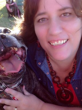 Vicki with her beloved Staffies.  Over 35 years of loving and rescuing this breed.